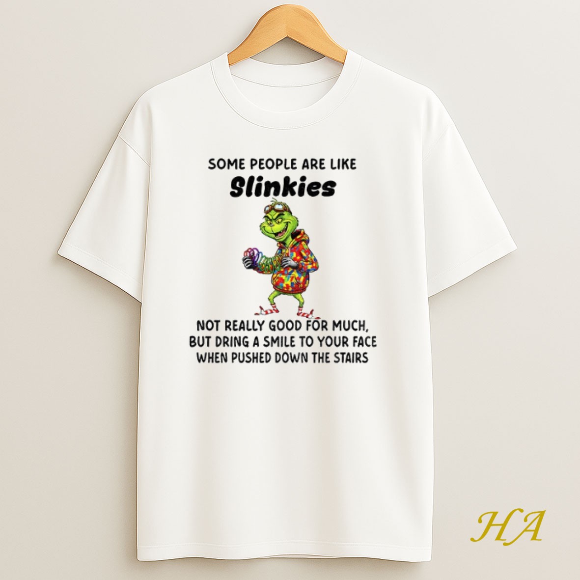 Official Grinch Some People Are Like Slinkies Not Really Good For Much But Dring A Smile To Your Face Christmas Shirt