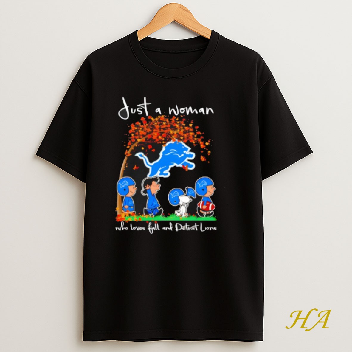 Official Peanuts Just A Woman Who Loves Fall And Detroit Lions Team Happy Fall Nfl T Shirt