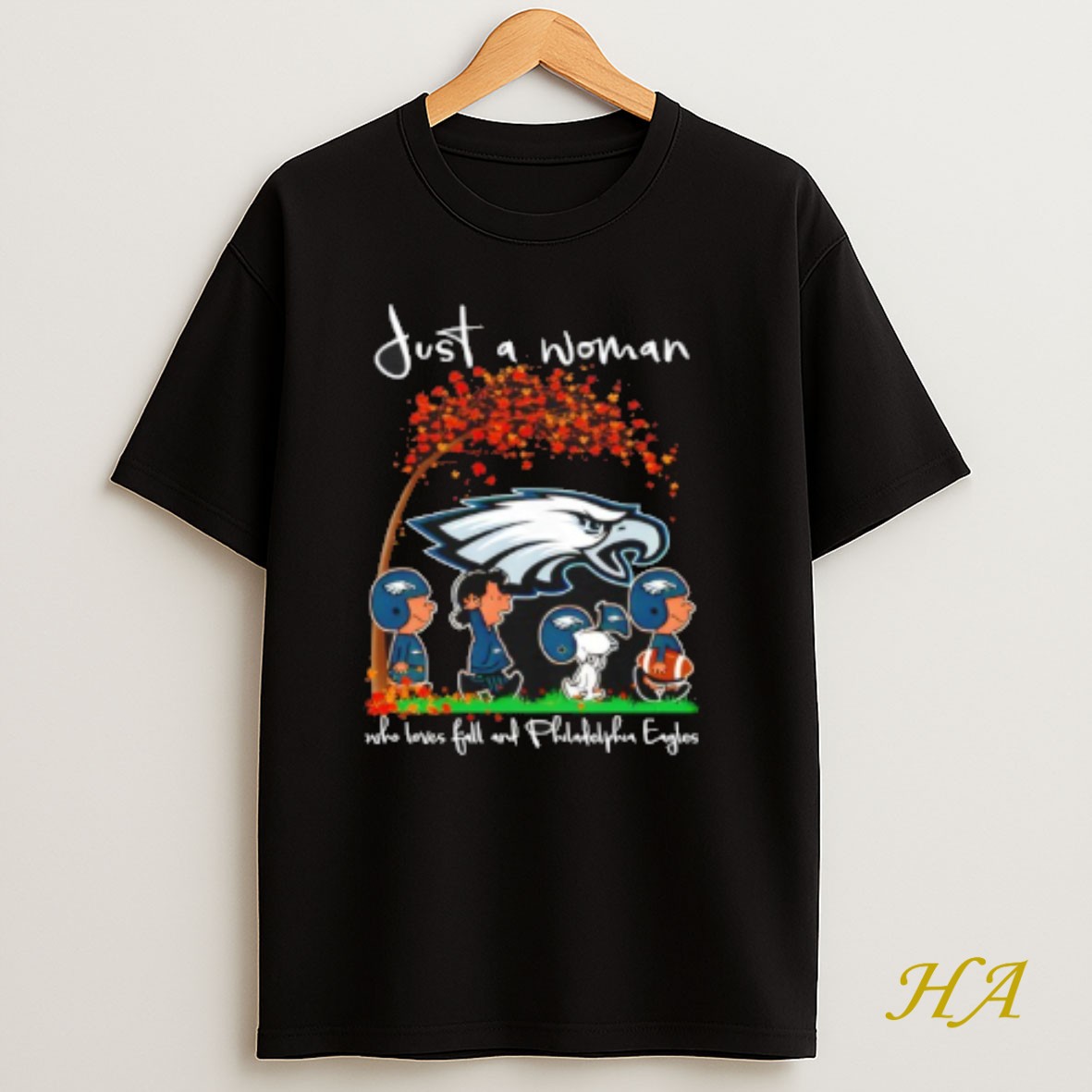 Official Peanuts Just A Woman Who Loves Fall And Eagles Team Happy Fall Nfl T Shirt