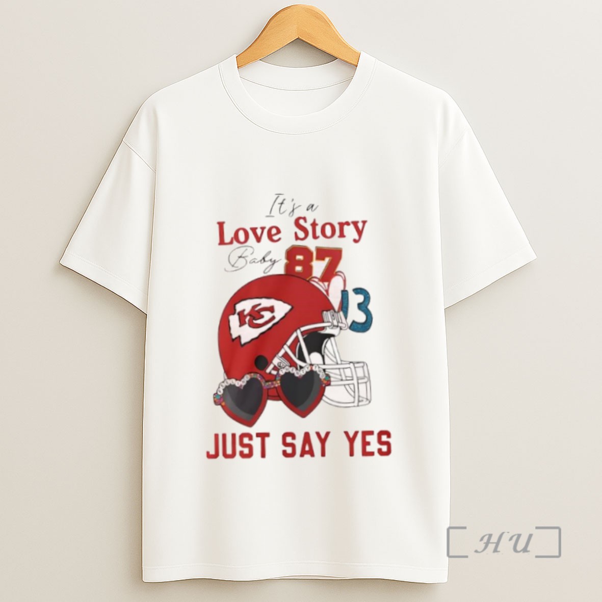 Premium Kansas City Chiefs Its A Love Story Baby Just Say Yes Travis Kelce Vs Taylor Helmet Sweatshirt Tee Shirt
