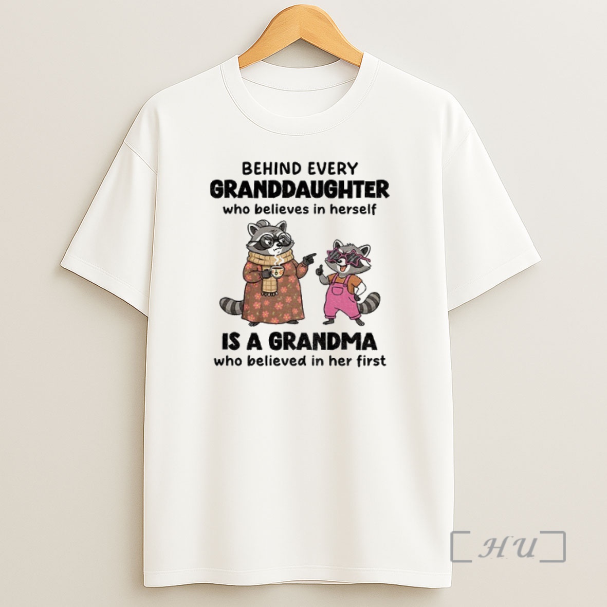 Trending Raccoon Behind Every Granddaughter Who Believes In Herself Is A Grandma Who Believed In Her First Premium Shirt Sweatshirt Tee