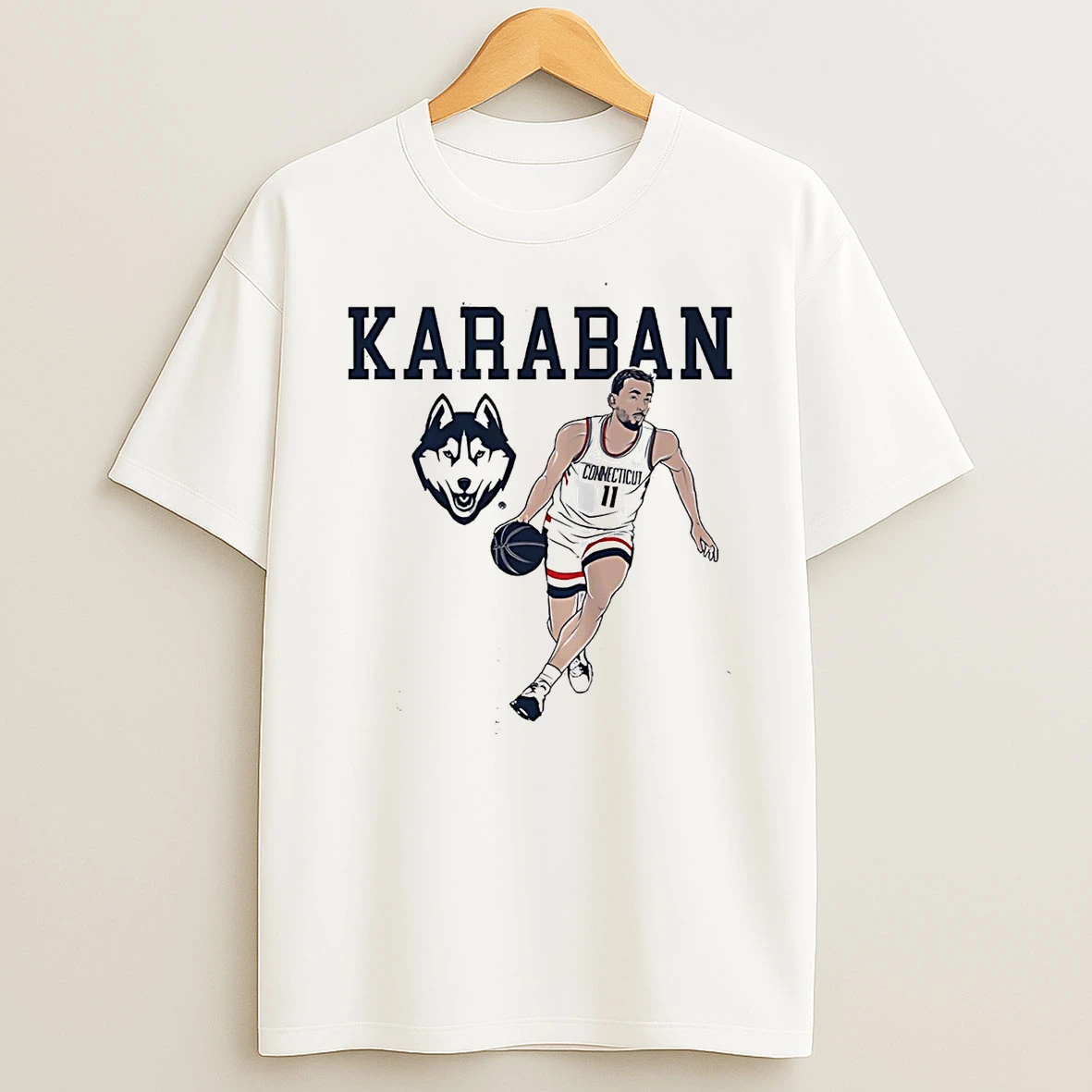 Alex Karaban Dribbling Uconn Huskies Shirts