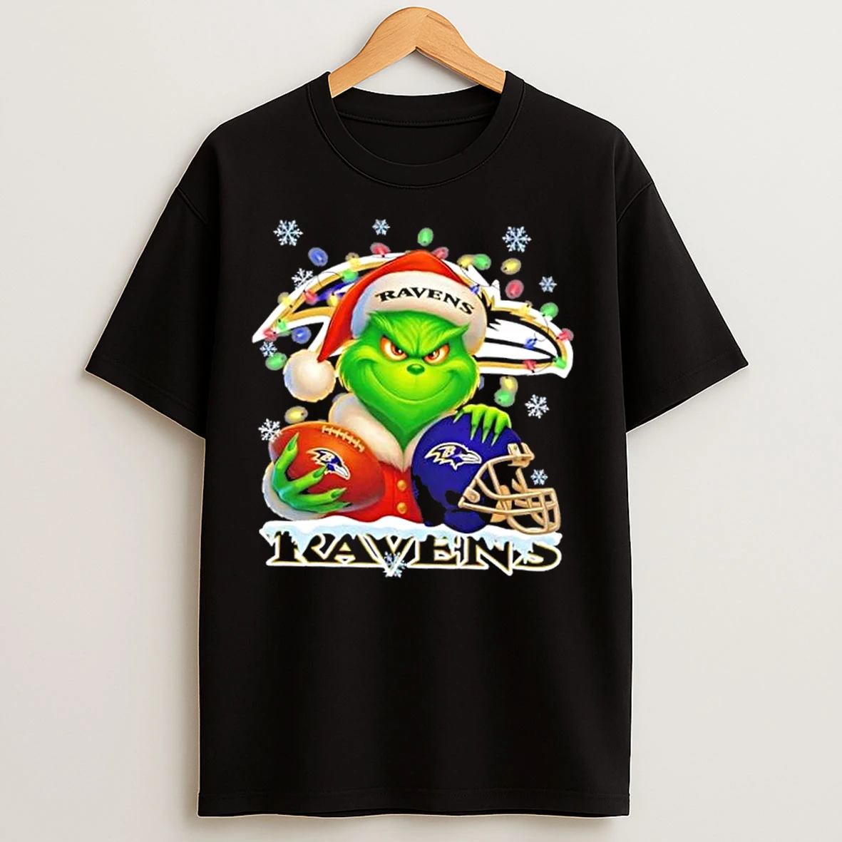 Classic Grinch Christmas Lights Holding A Ball And Smiling At Baltimore Ravens Fans T Shirts