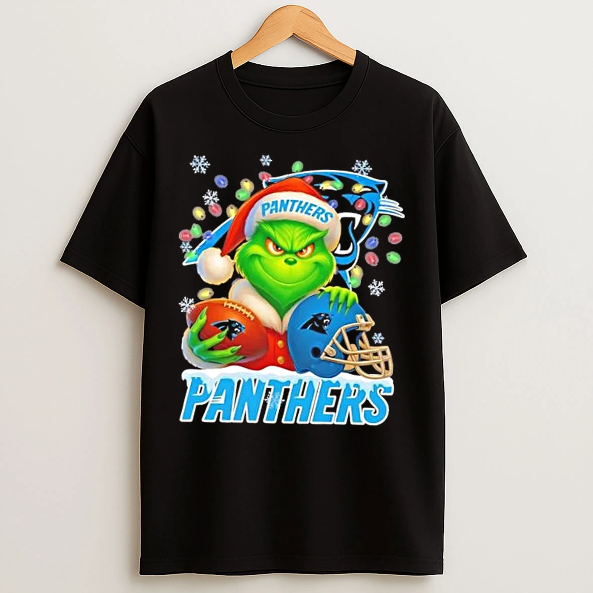 Classic Grinch Christmas Lights Holding A Ball And Smiling At Carolina Panthers Fans T Shirts