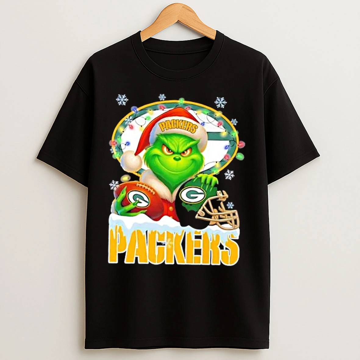 Classic Grinch Christmas Lights Holding A Ball And Smiling At Green Bay Packers Fans T Shirts
