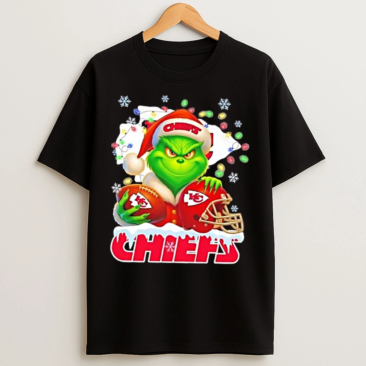 Classic Grinch Christmas Lights Holding A Ball And Smiling At Kansas City Chiefs Fans T Shirts