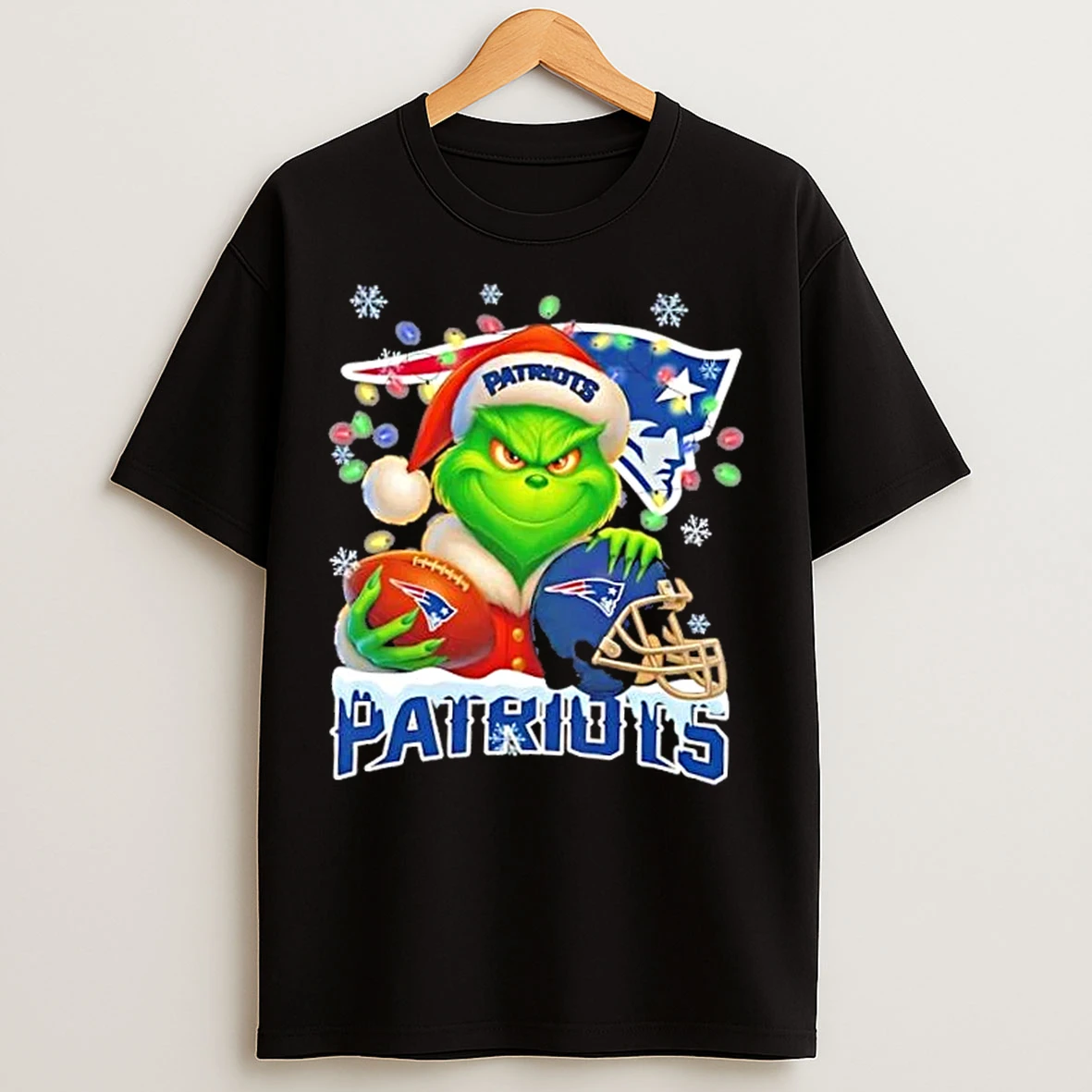 Classic Grinch Christmas Lights Holding A Ball And Smiling At New England Patriots Fans T Shirts
