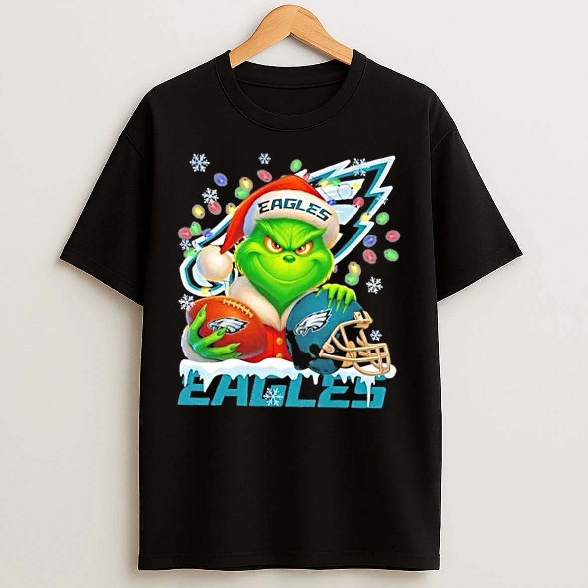 Classic Grinch Christmas Lights Holding A Ball And Smiling At Philadelphia Eagles Fans T Shirts