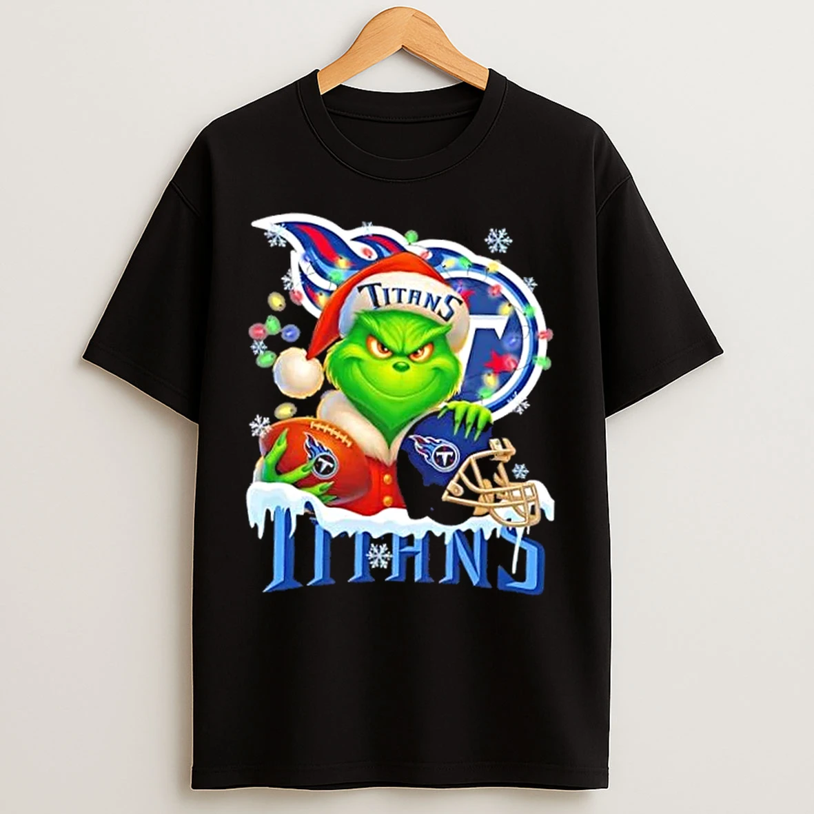 Classic Grinch Christmas Lights Holding A Ball And Smiling At Tennessee Titans Fans T Shirts