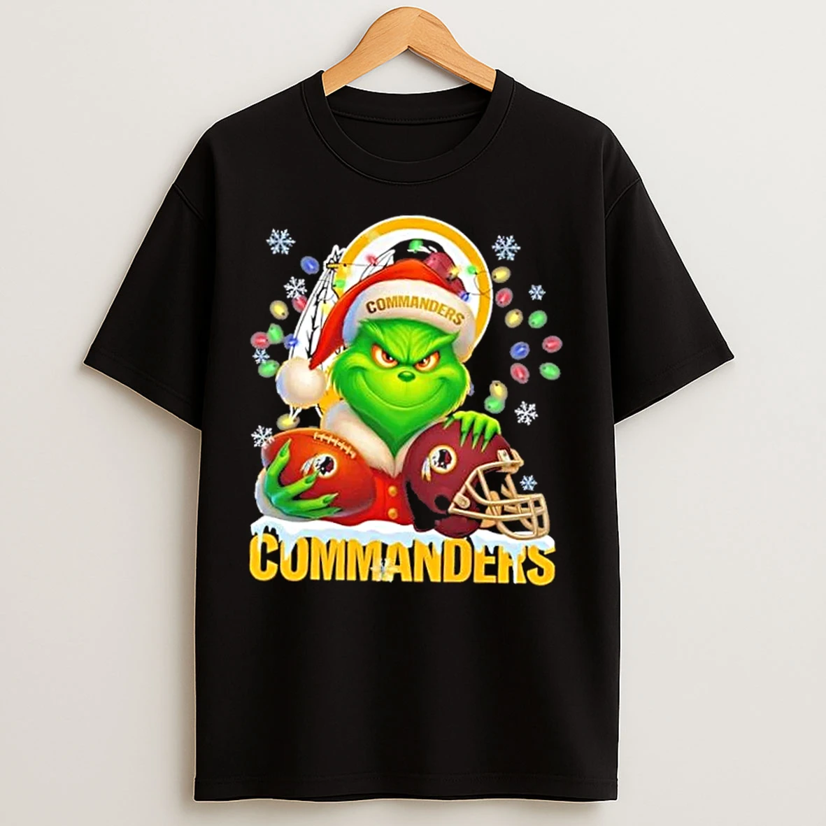 Classic Grinch Christmas Lights Holding A Ball And Smiling At Washington Commanders Fans T Shirts