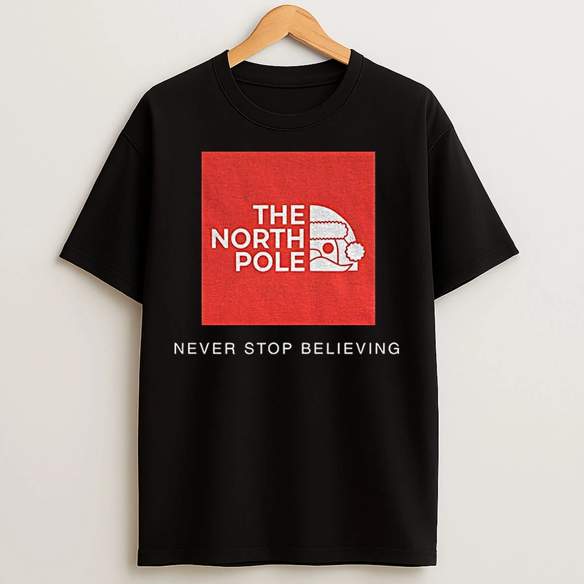 Classic North Pole Never Stop Believing Christmas T Shirts