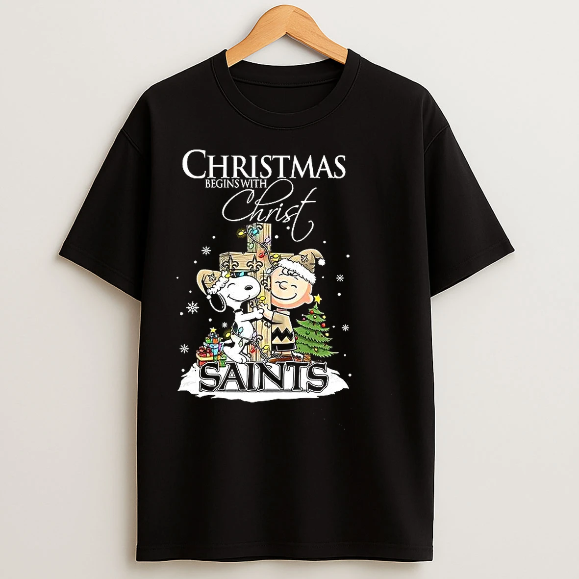 Classic Snoopy And Charlie Brown X New Orleans Saints Christmas Begins With Christ Cross T Shirts