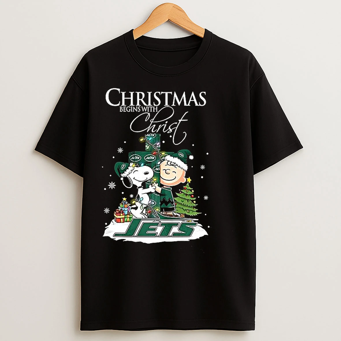 Classic Snoopy And Charlie Brown X New York Jets Christmas Begins With Christ Cross T Shirts