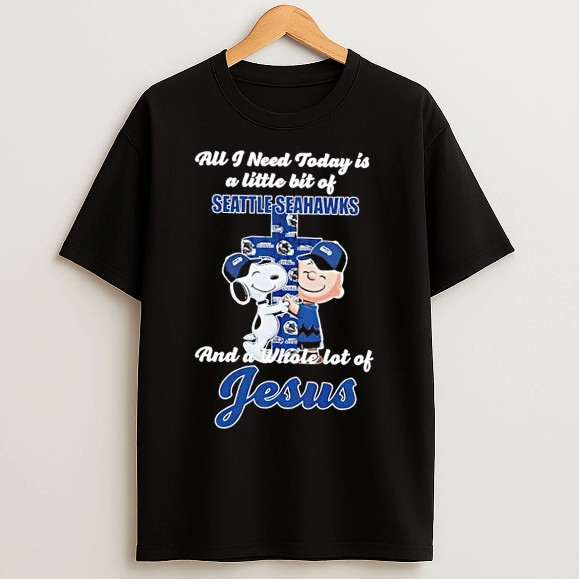 Classic Snoopy And Charlie Brown Hug Cross A Little Bit Of Seattle Seahawks And A Whole Lot Of Jesus T Shirts