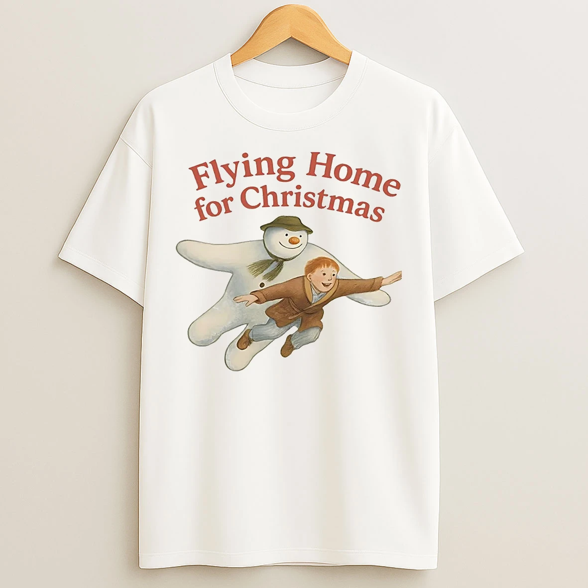 Classic Snowman Flying Home For Christmas T Shirts