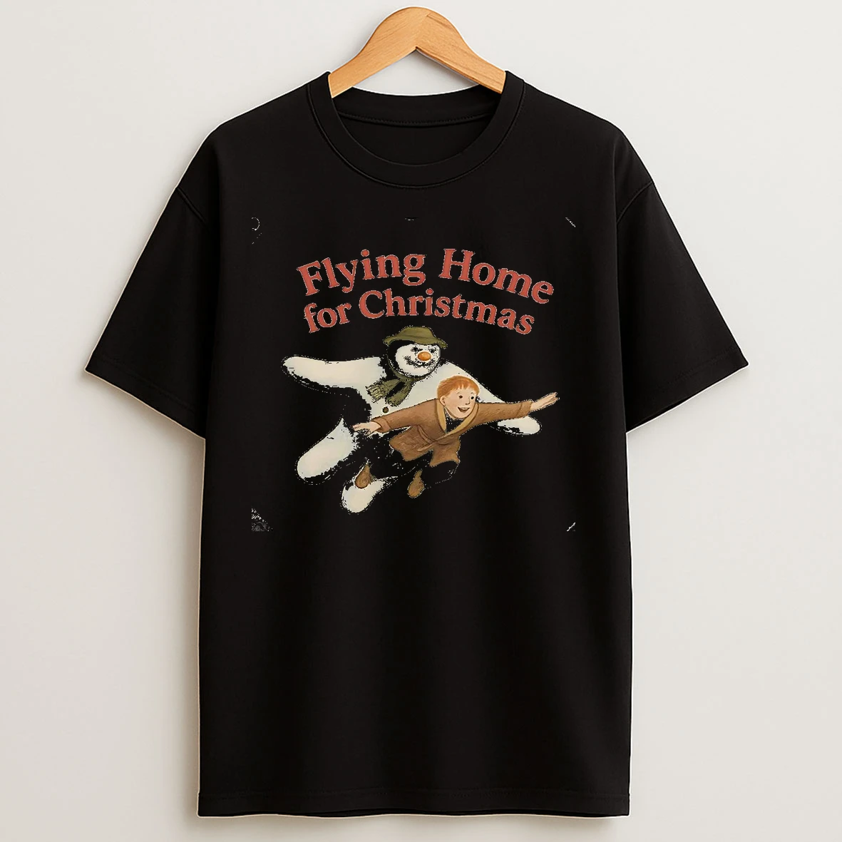 Classic Snowman Flying Home For Christmas Christmas T Shirts