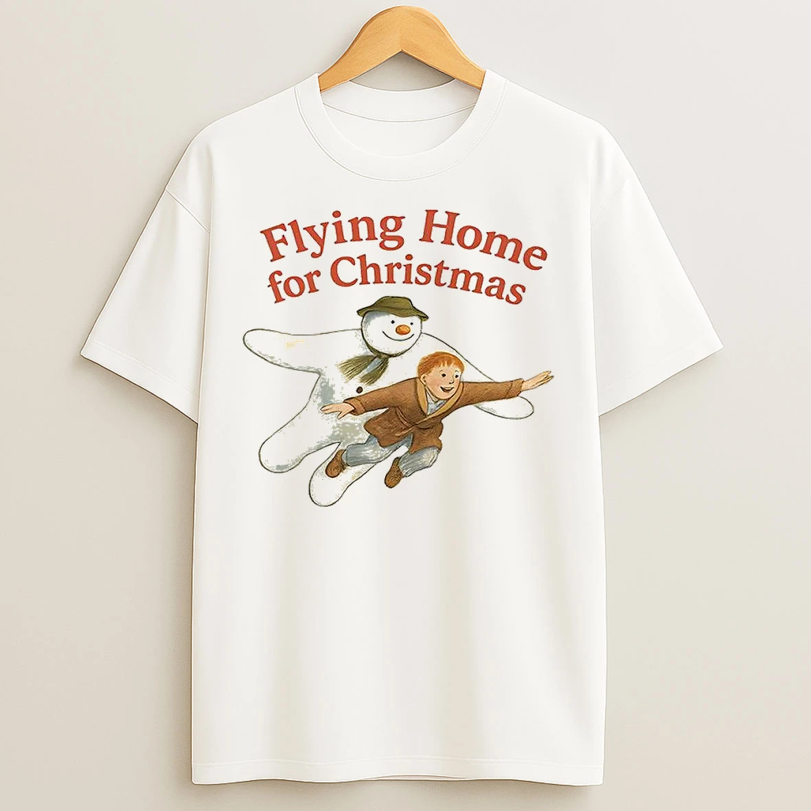 Classic The Snowman Flying Home For Christmas T Shirts