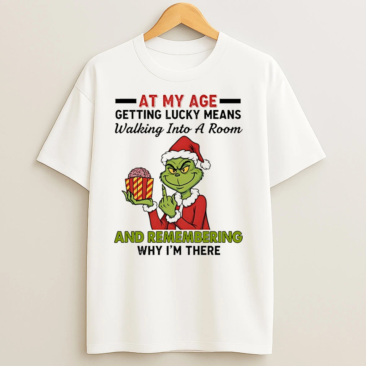 Funny Grinch Santa Hat At My Age Getting Lucky Means Walking Into A Room And Remembering Merry Christmas T Shirts