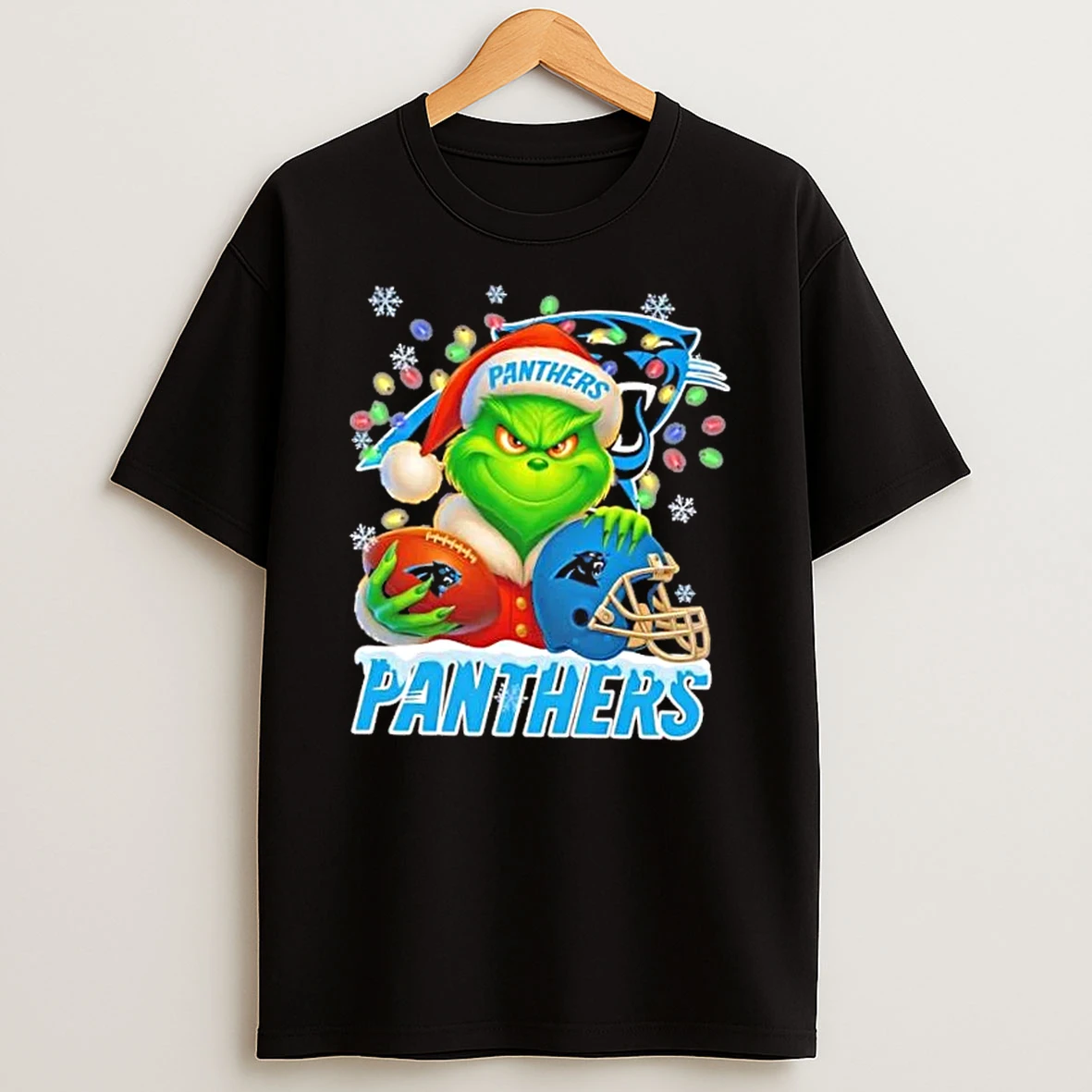 Grinch Christmas Lights Holding A Ball And Smiling At Carolina Panthers Fans Shirts