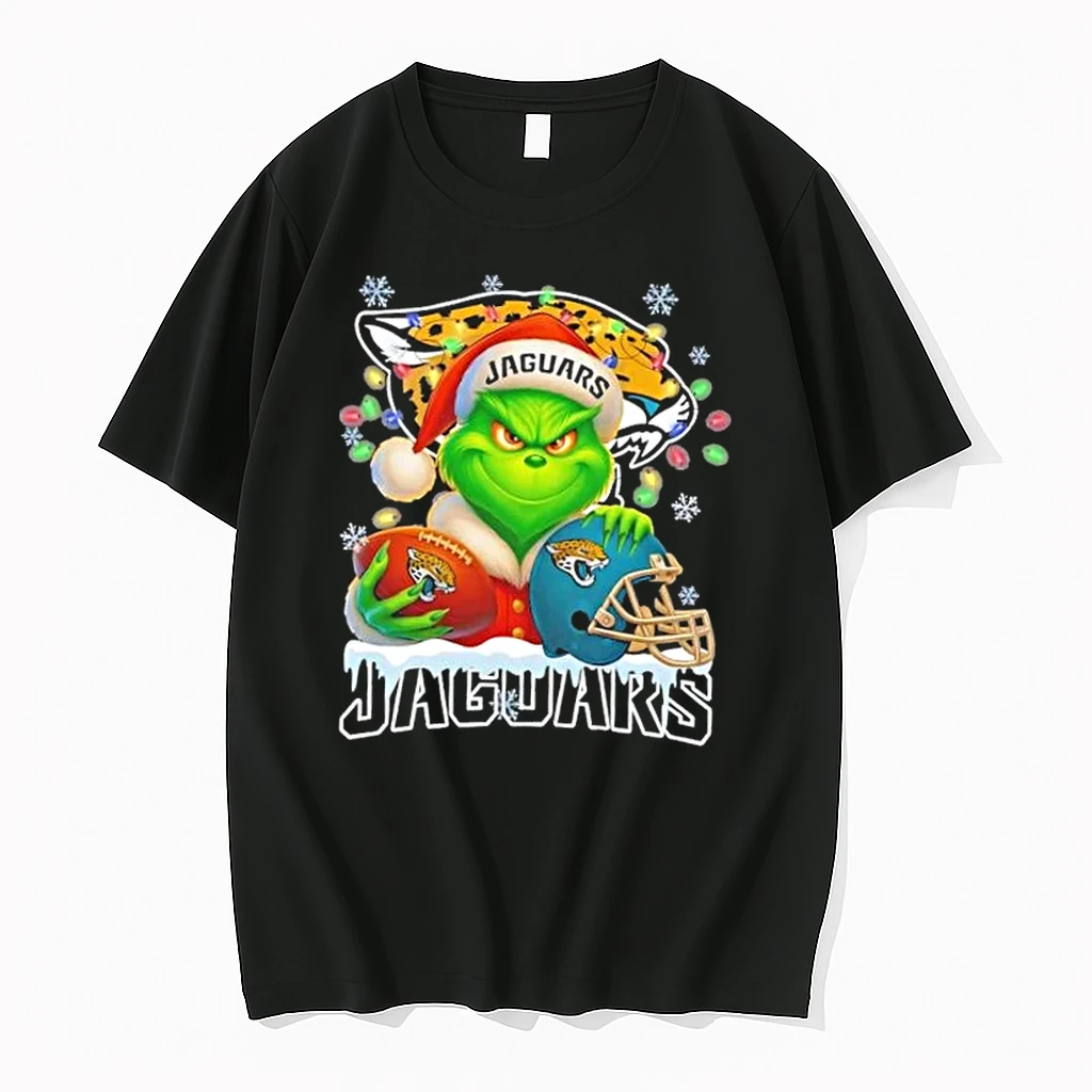Grinch Christmas Lights Holding A Ball And Smiling At Jacksonville Jaguars Fans Shirts