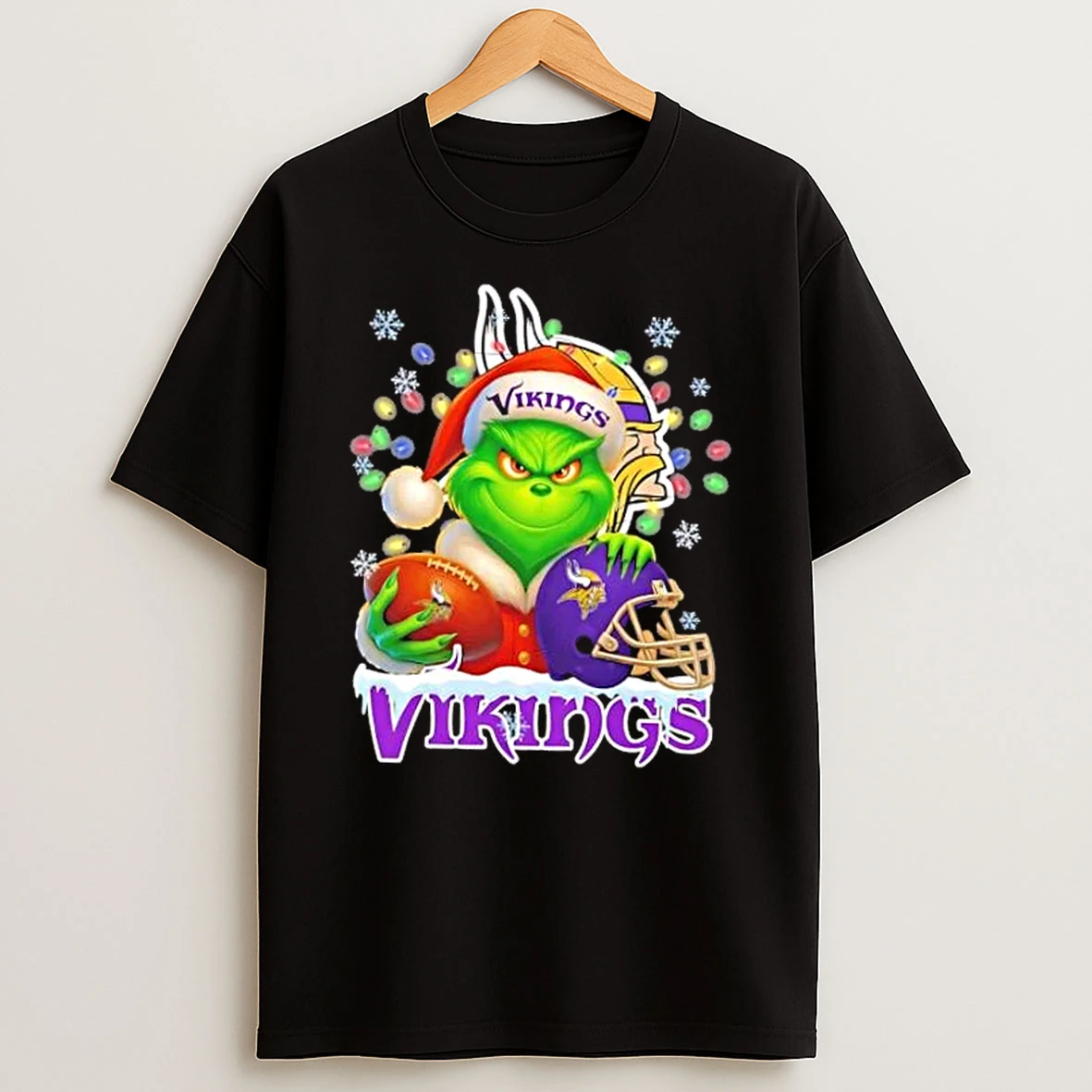 Grinch Christmas Lights Holding A Ball And Smiling At Minnesota Vikings Fans Shirts