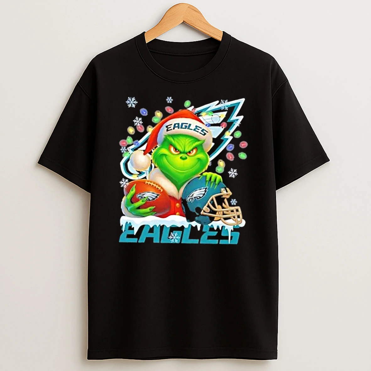 Grinch Christmas Lights Holding A Ball And Smiling At Philadelphia Eagles Fans Shirts