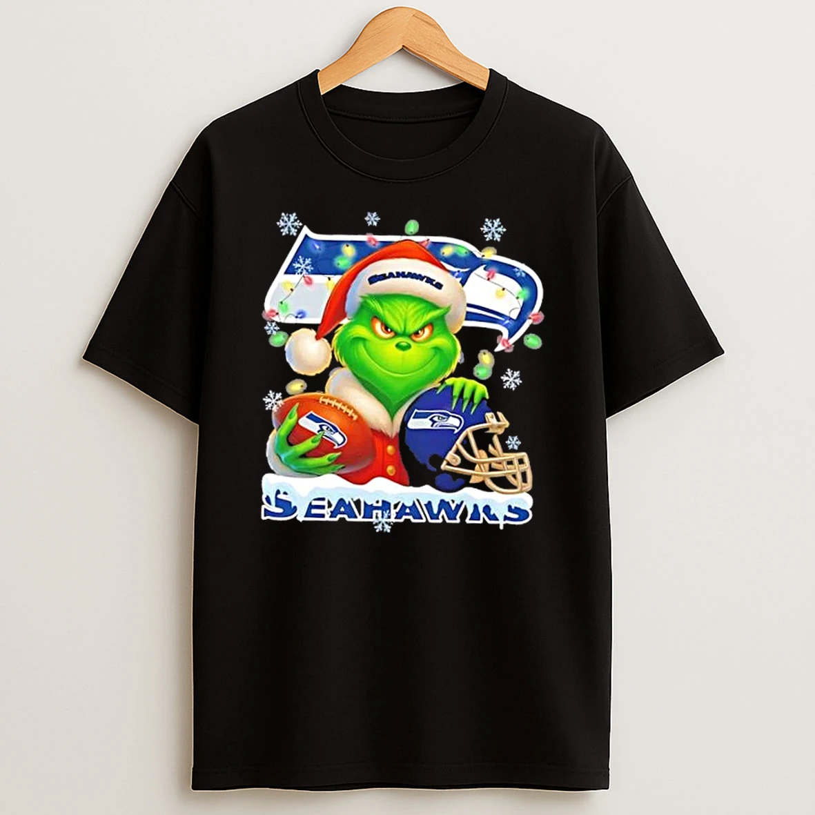 Grinch Christmas Lights Holding A Ball And Smiling At Seattle Seahawks Fans Shirts