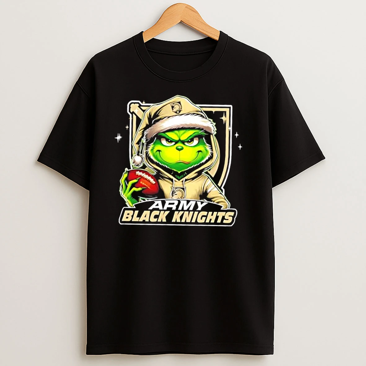 Grinch Is Holding A Ball And Smiling At Army Black Knights Fans Christmas T Shirts