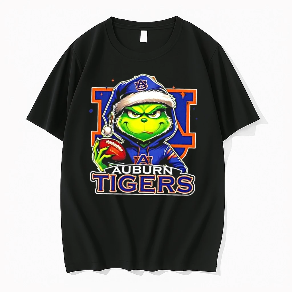 Grinch Is Holding A Ball And Smiling At Auburn Tigers Fans Christmas Shirts