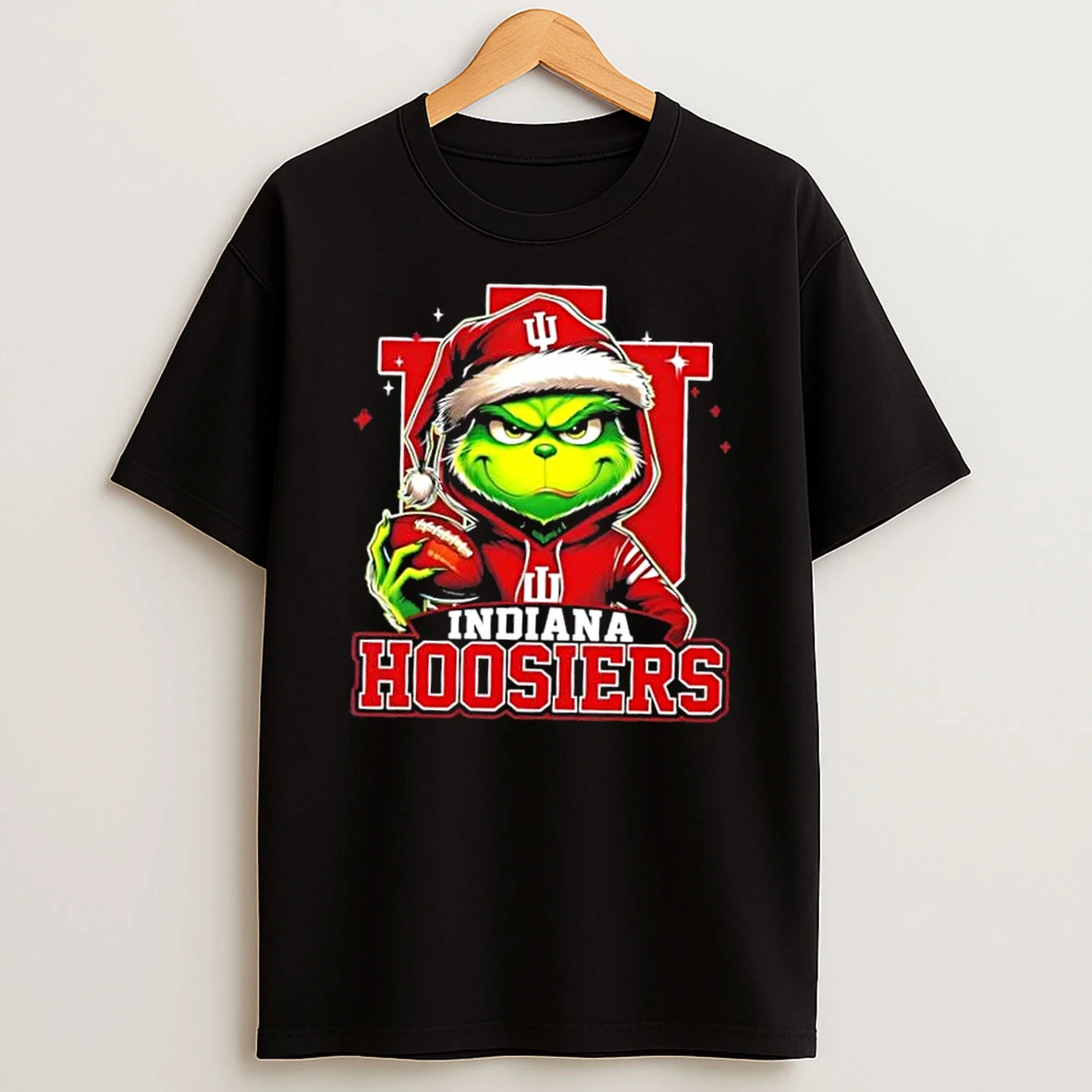 Grinch Is Holding A Ball And Smiling At Indiana Hoosiers Fans Christmas Shirts