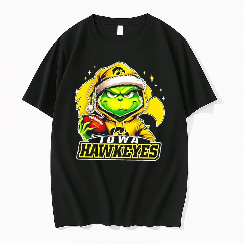 Grinch Is Holding A Ball And Smiling At Iowa Hawkeyes Fans Christmas Shirts