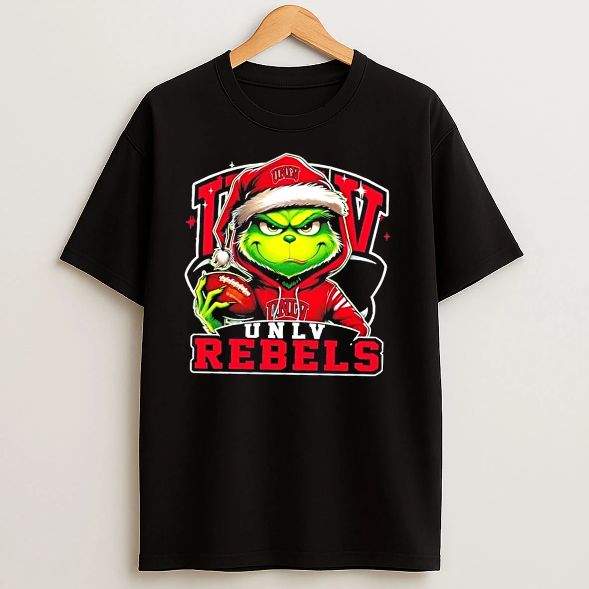 Grinch Is Holding A Ball And Smiling At Unlv Rebels Fans Christmas T Shirts