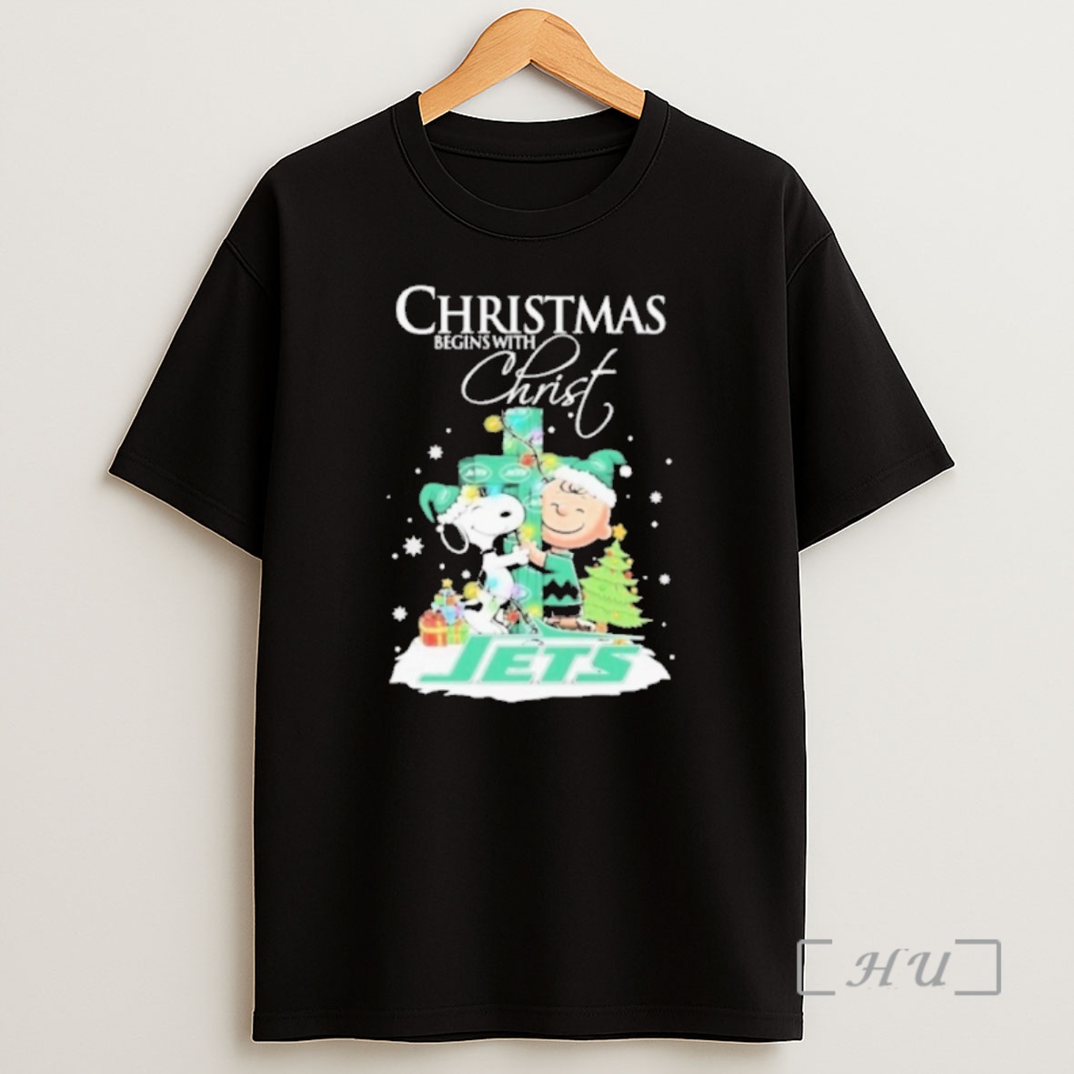 Officials 2025 Snoopy And Charlie Brown The Peanuts X New York Jets Merry Christmas Begins With Christ Premium Shirt Sweatshirt Tee