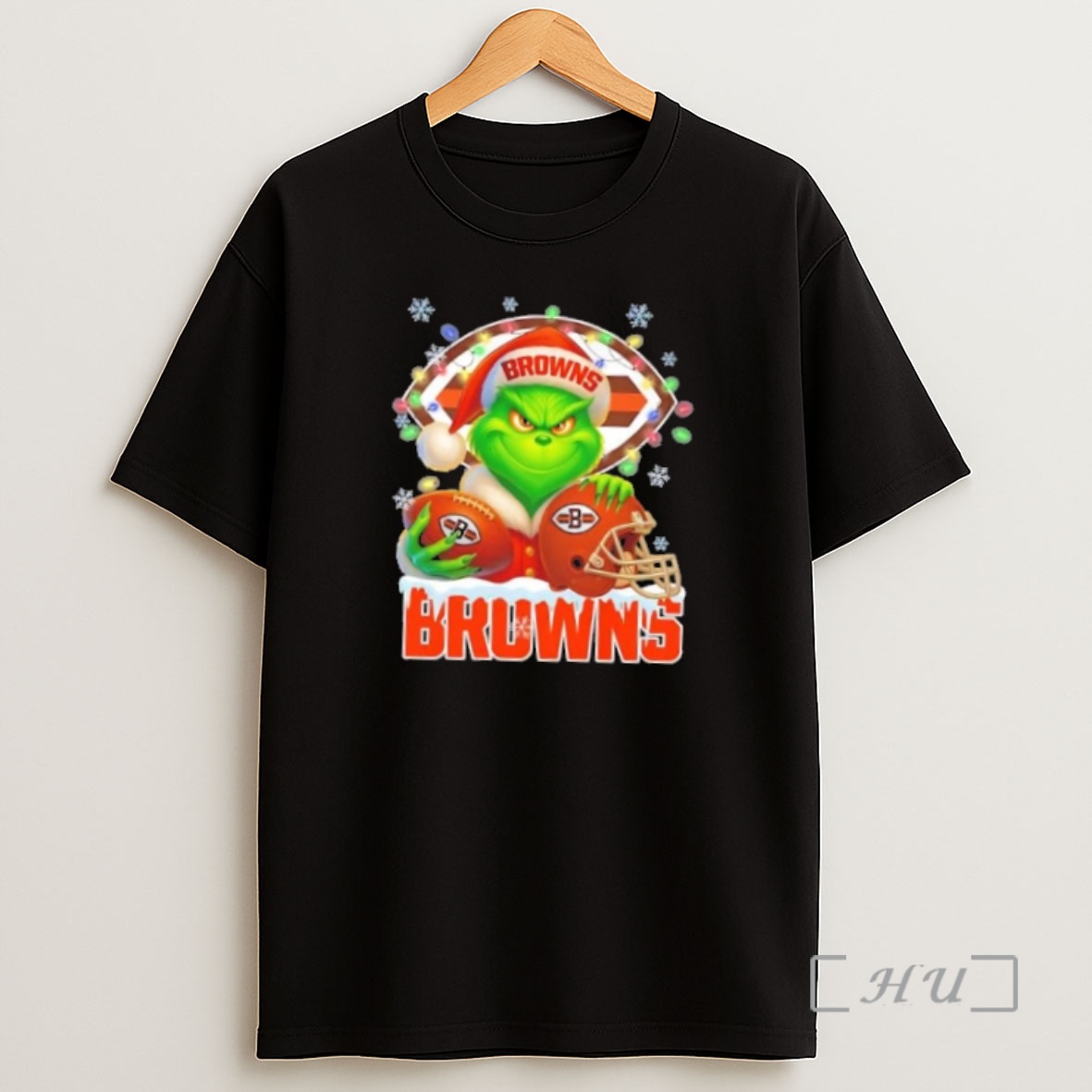 Officials Grinch Christmas Lights Holding A Ball And Smiling At Cleveland Browns Fans Premium Shirt Sweatshirt Tee
