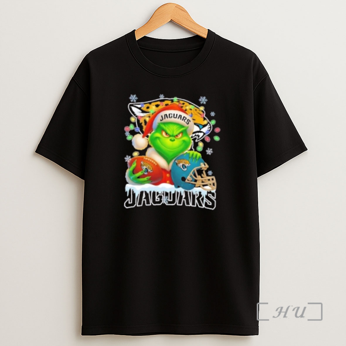 Officials Grinch Christmas Lights Holding A Ball And Smiling At Jacksonville Jaguars Fans Premium Shirt Sweatshirt Tee