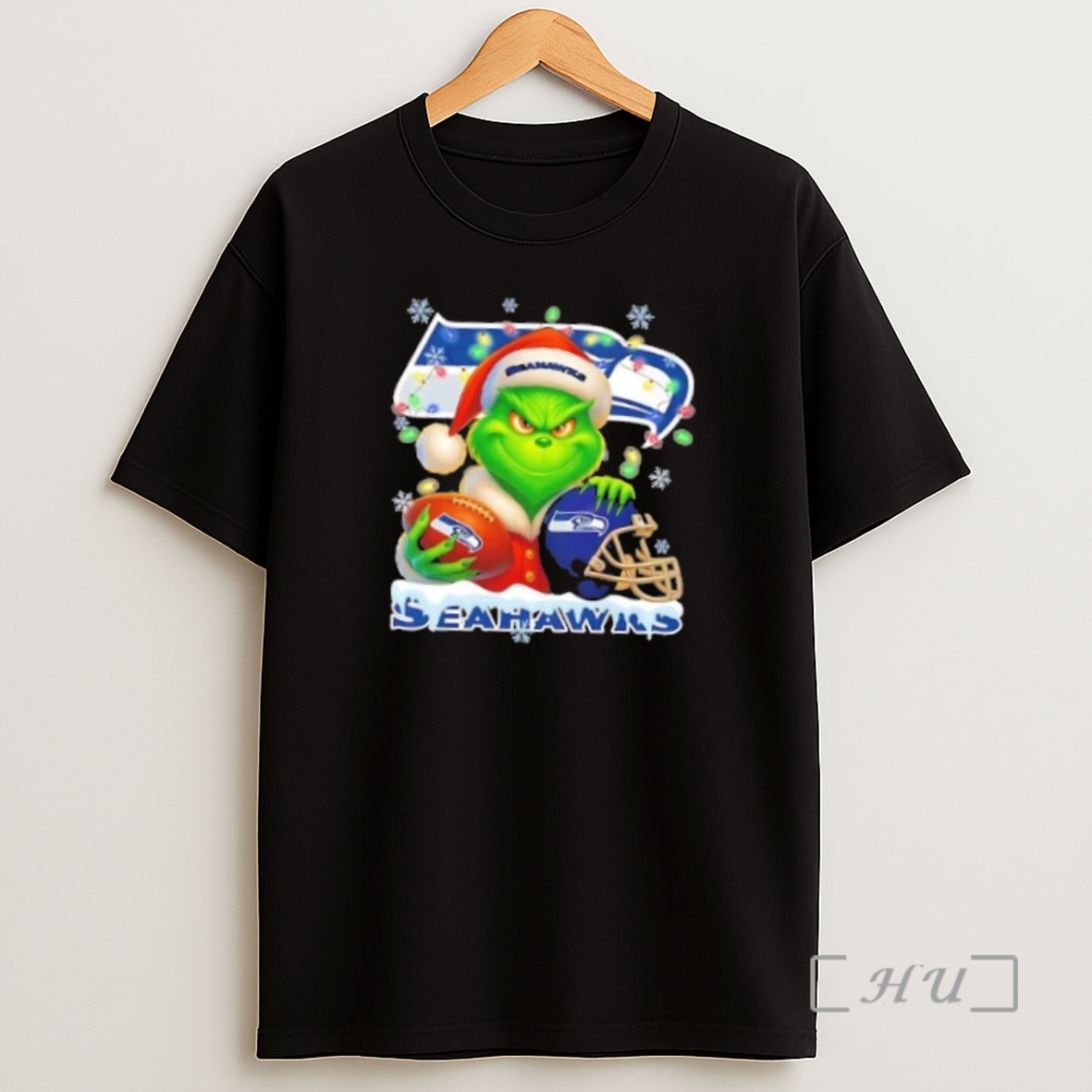 Officials Grinch Christmas Lights Holding A Ball And Smiling At Seattle Seahawks Fans Premium Shirt Sweatshirt Tee