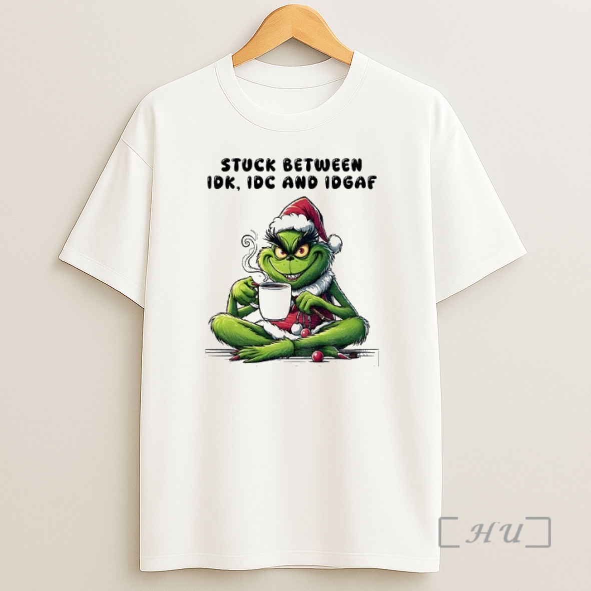 Officials Grinch Santa Hat Drink Coffee Stuck Between Idk Idc And Idgaf Christmas Premium Shirt Sweatshirt Tee