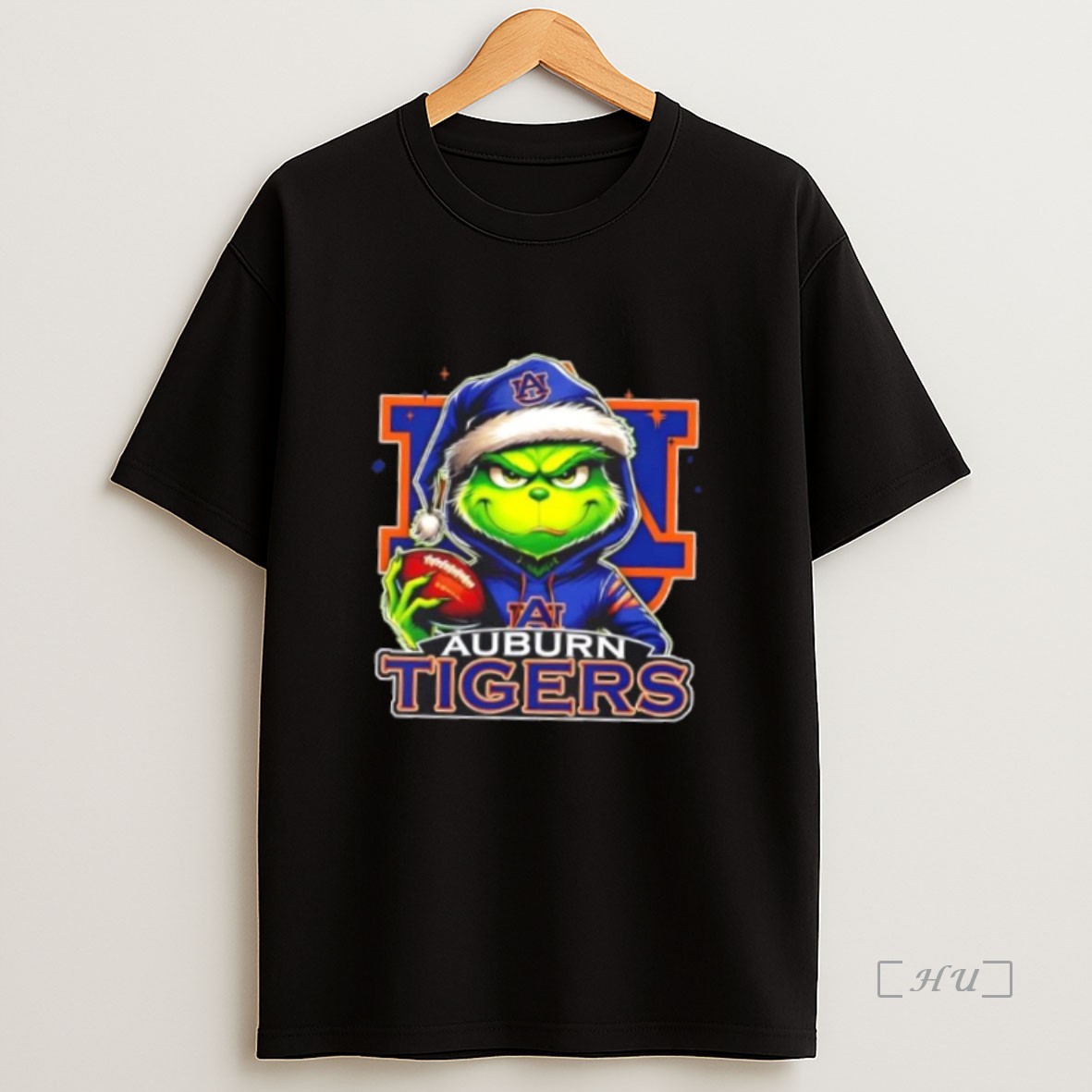 Officials Grinch Is Holding A Ball And Smiling At Auburn Tigers Fans Christmas Premium Shirt Sweatshirt Tee