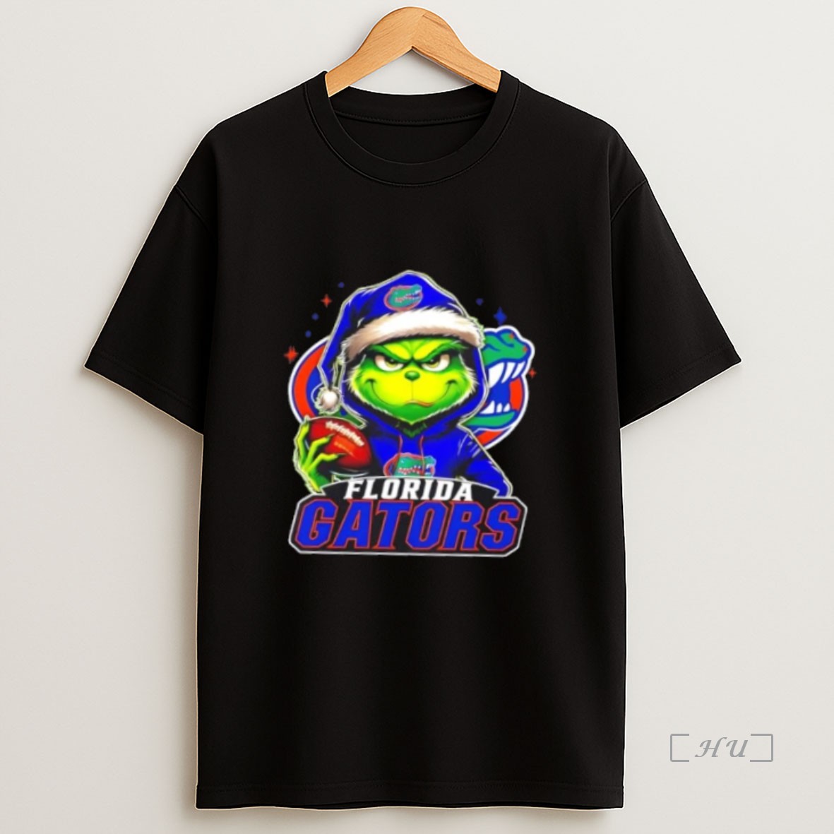 Officials Grinch Is Holding A Ball And Smiling At Florida Gators Fans Christmas Premium Shirt Sweatshirt Tee