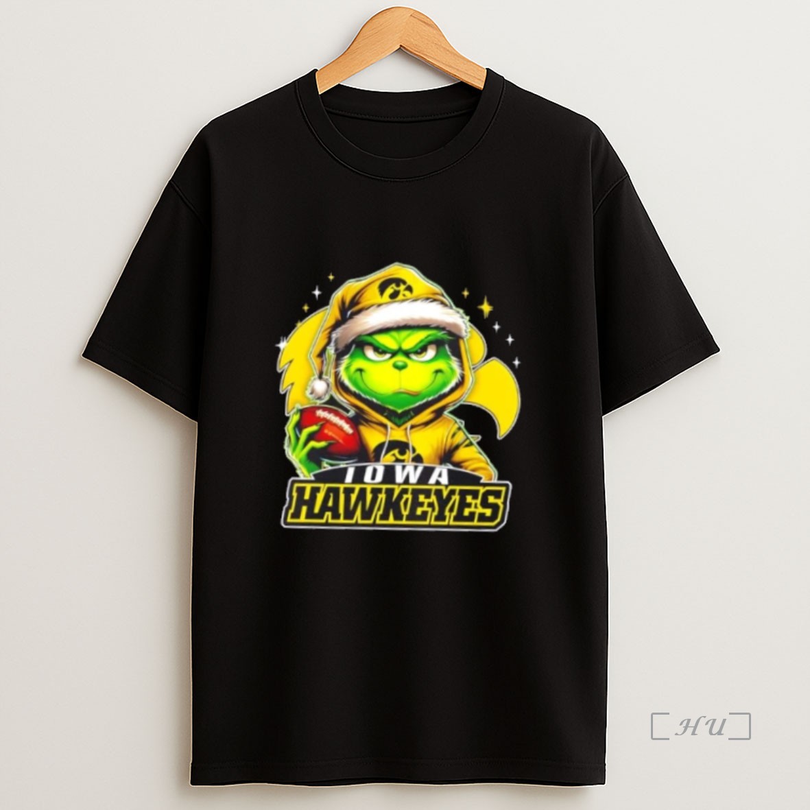 Officials Grinch Is Holding A Ball And Smiling At Iowa Hawkeyes Fans Christmas Premium Shirt Sweatshirt Tee