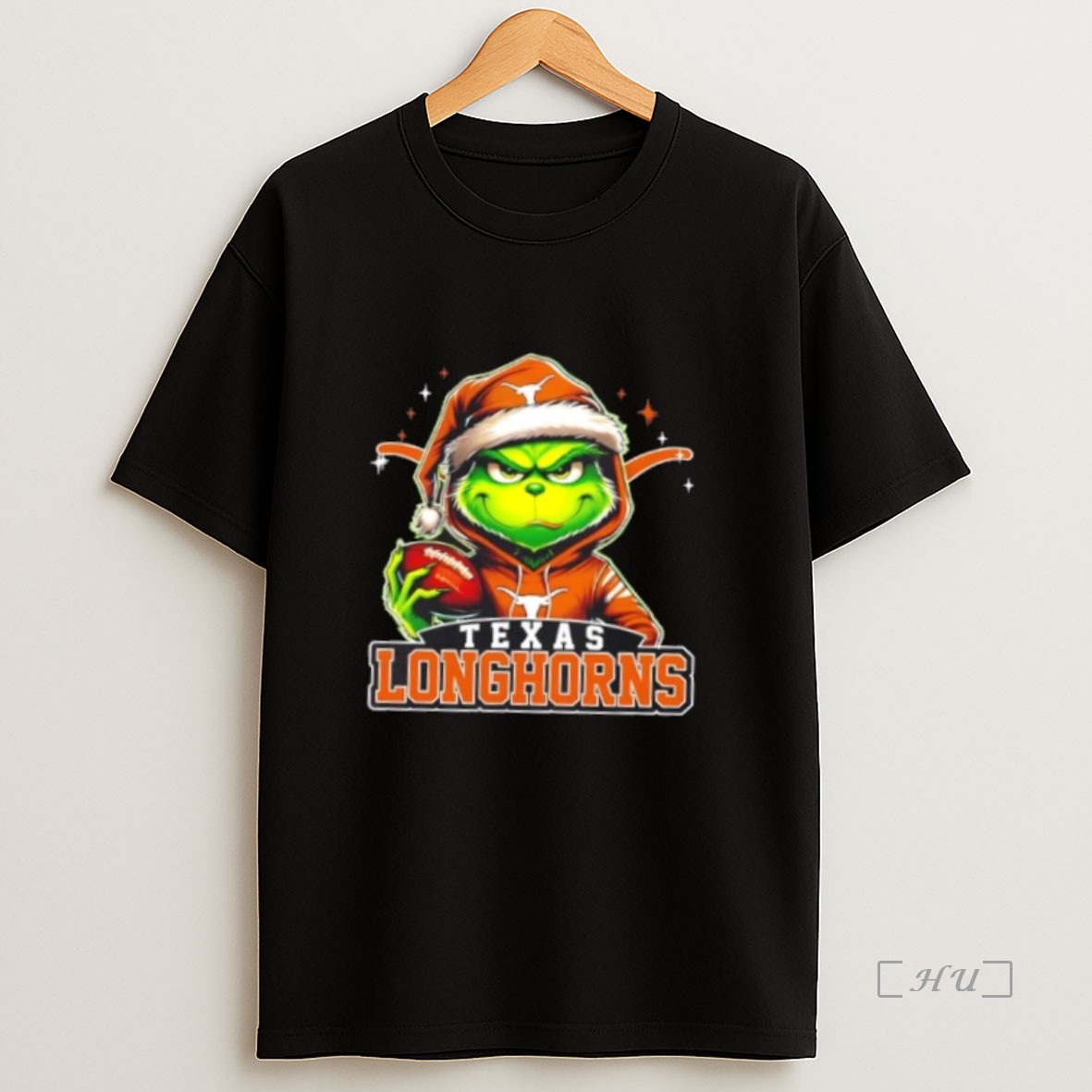 Officials Grinch Is Holding A Ball And Smiling At Texas Longhorns Fans Christmas Premium Shirt Sweatshirt Tee