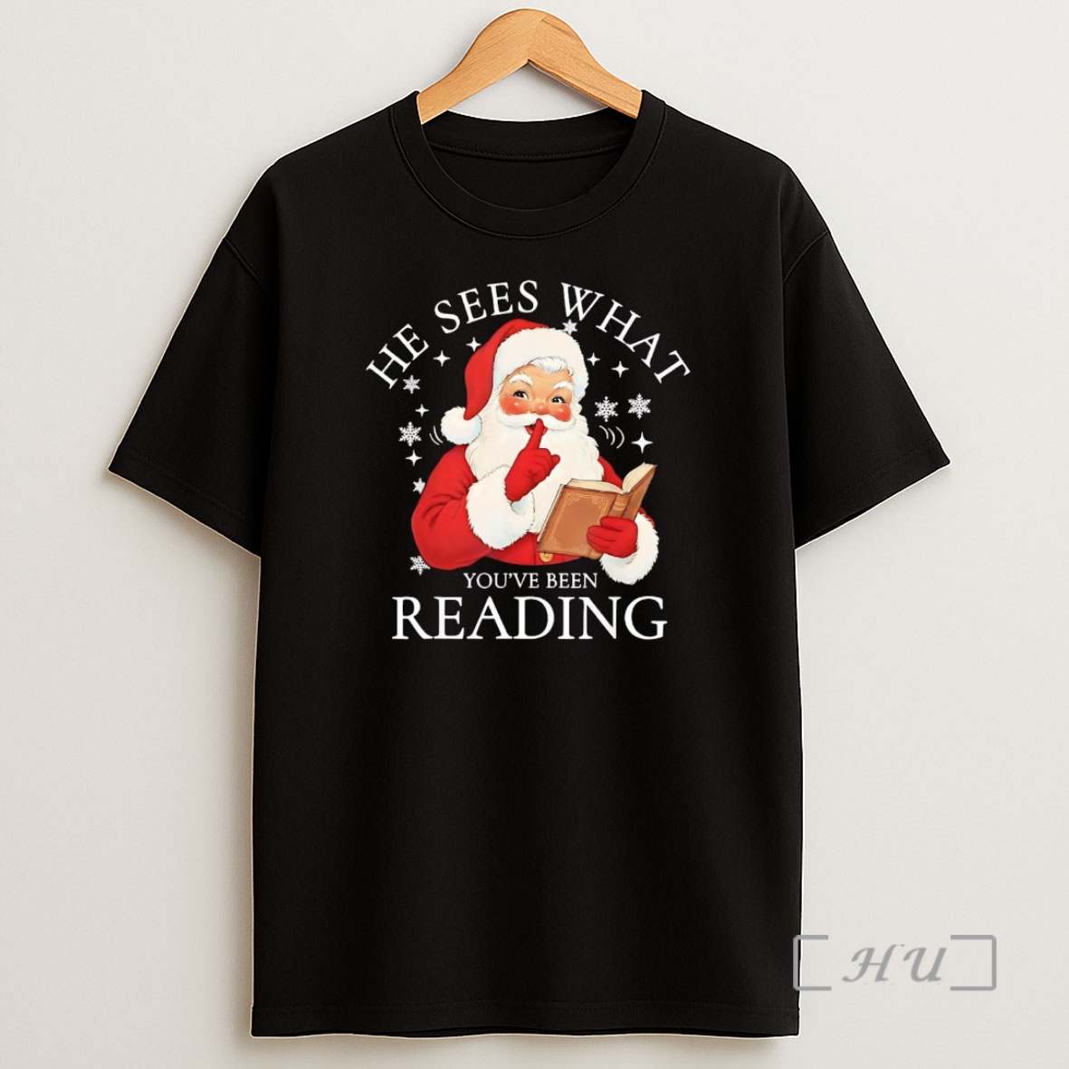 Officials Santa He Sees What Youve Been Reading Christmas Premium Shirt Sweatshirt Tee