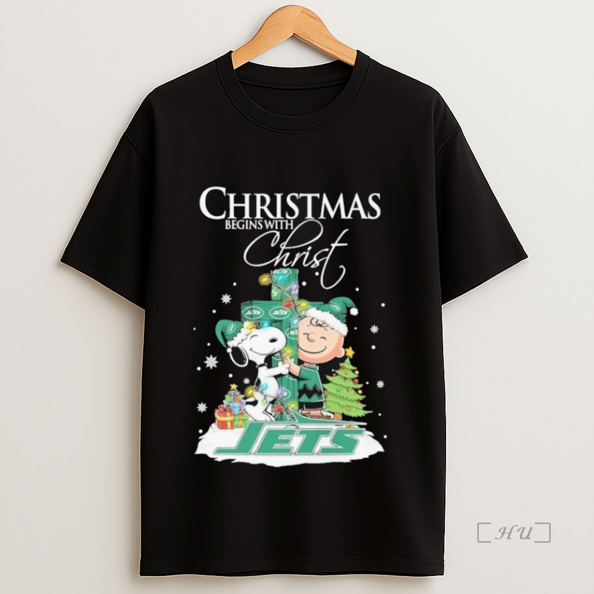 Officials Snoopy And Charlie Brown The Peanuts X New York Jets Merry Christmas Begins With Christ Premium Shirt Sweatshirt Tee