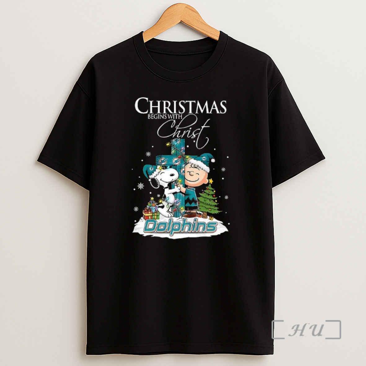 Officials Snoopy And Charlie Brown X Miami Dolphins Christmas Begins With Christ Cross Premium Shirt Sweatshirt Tee