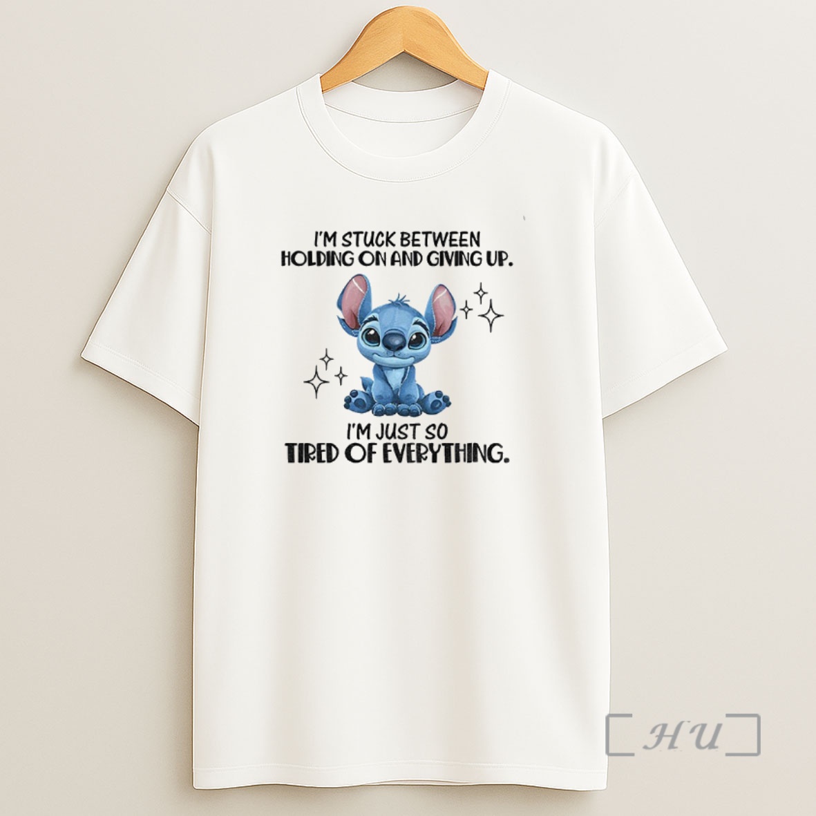 Officials Stitch Im Stuck Between Holding On And Giving Up Im Just So Tired Of Everything Premium Shirt Sweatshirt Tee
