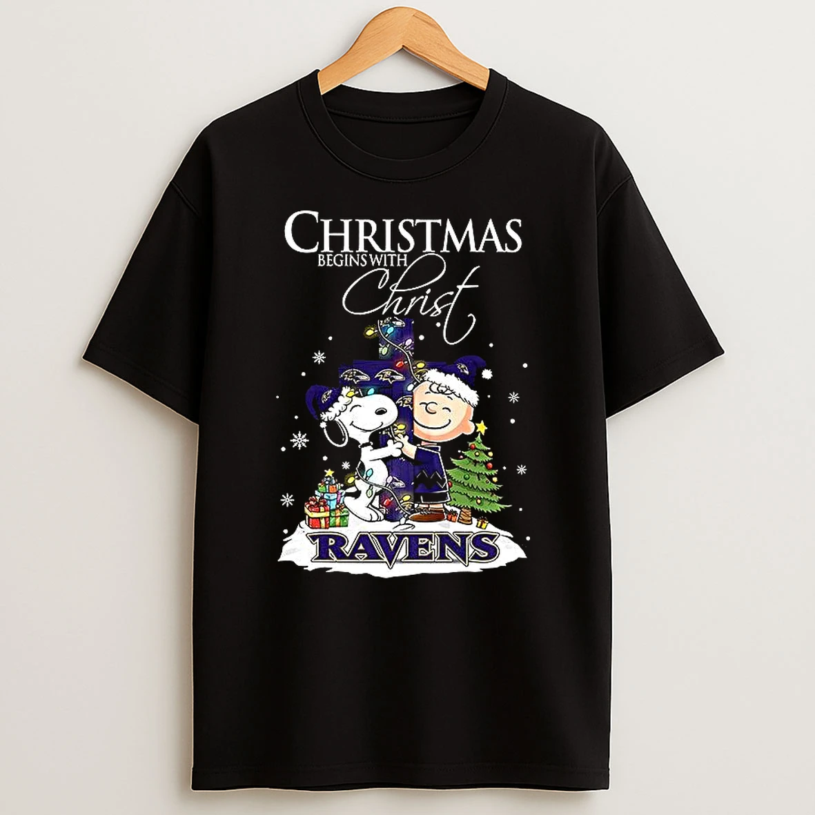 Snoopy And Charlie Brown X Baltimore Raven Christmas Begins With Christ Cross Shirts