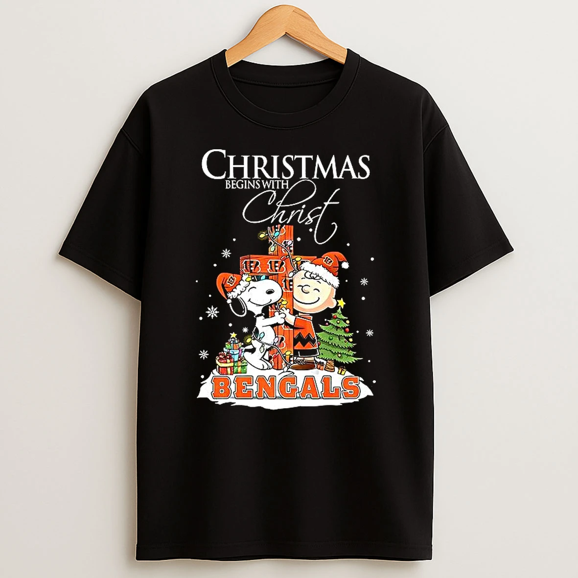 Snoopy And Charlie Brown X Cincinnati Bengals Christmas Begins With Christ Cross Shirts