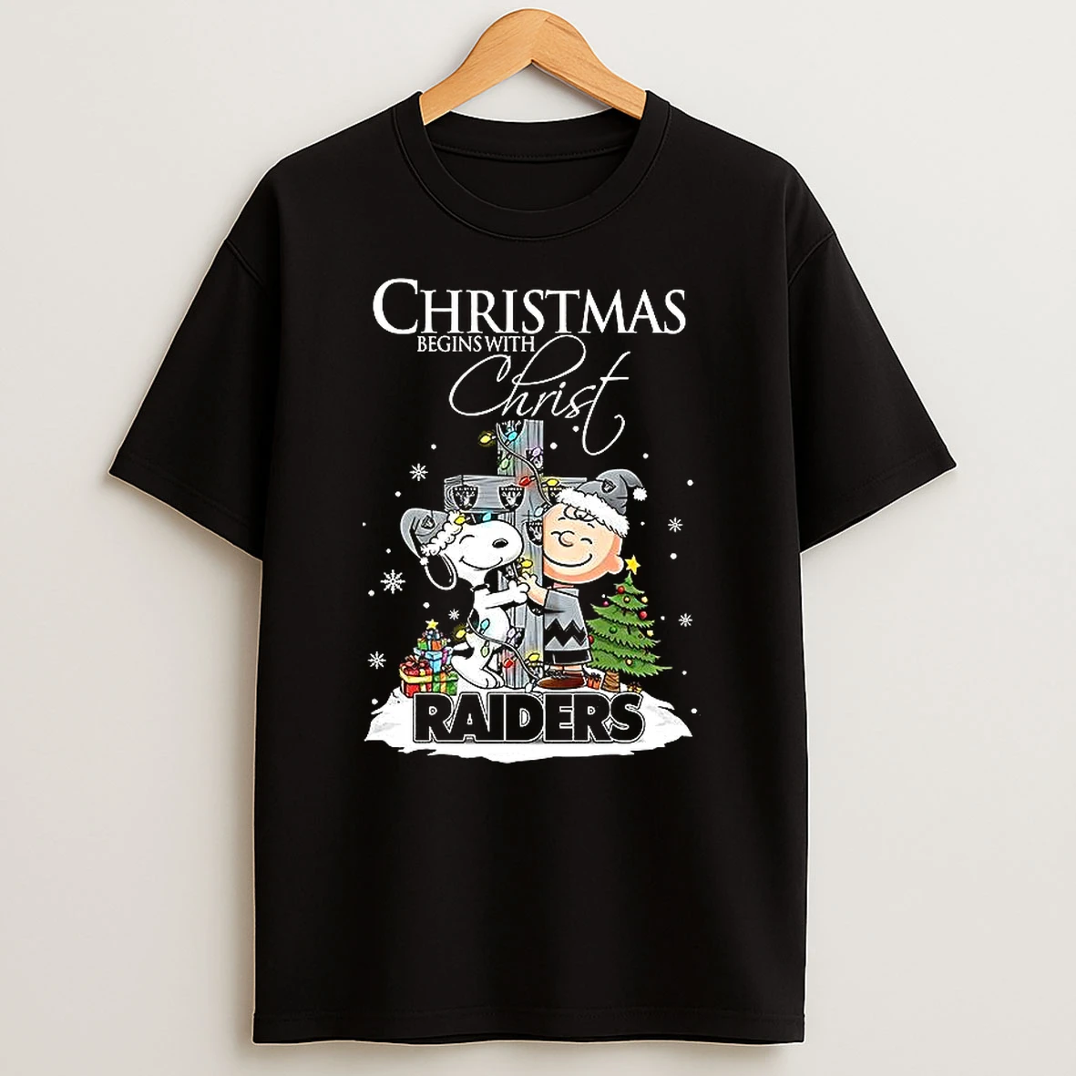 Snoopy And Charlie Brown X Las Vegas Raiders Christmas Begins With Christ Cross Shirts