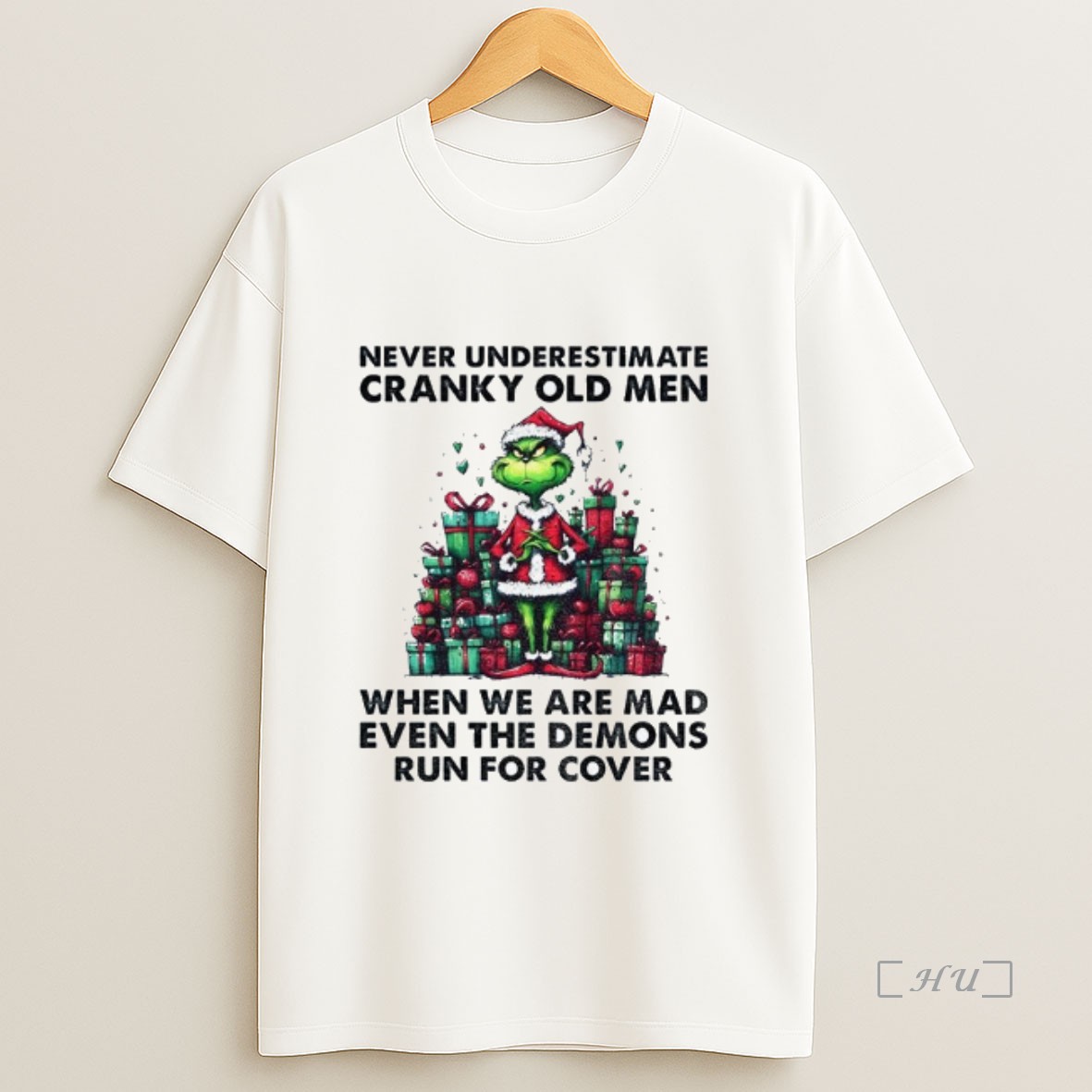 Trending Grinch Santa Hat Never Underestimate Cranky Old Men When We Are Mad Even The Demons Run For Cover Christmas Premium Shirt Sweatshirt Tee