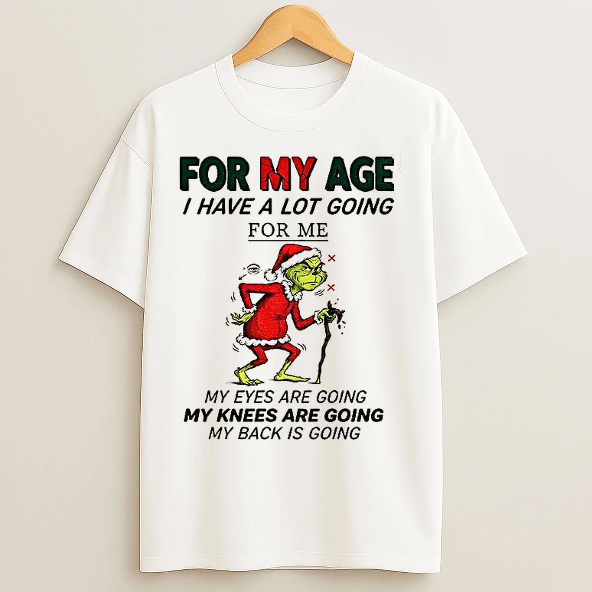Classic Grinch Santa For My Age I Have A Lot Going For Me My Eyes Are Going My Knees Are Going My Back Is Going Christmas T Shirts